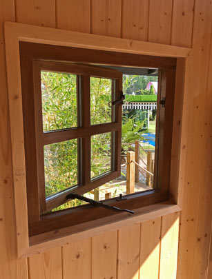 Hard wood framed window in a Dublin show garden treehouse.