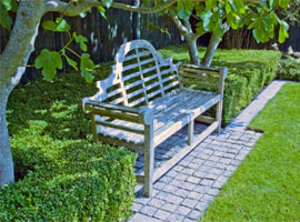 Lutyens Bench creates a focal point from the patio.