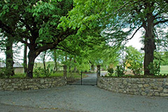 This garden restoration in Ireland included a new entrance with granite walls.